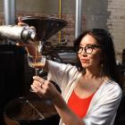Celeste Wong pours a coffee Margarita at Grid Coffee in Dunedin during her recent visit to see...