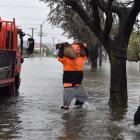 Preparing for flooding in South Dunedin last year. PHOTO: STEPHEN JAQUIERY