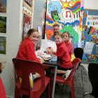 Kaiapoi North School students Bonnie (9, left), Alyssa (10) and Indi (10) show principal Jason...