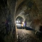 Visitors explore the Chain Hills tunnel, planned to be part of a cycle trail between Dunedin and...