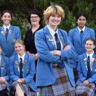 Queen’s High School head girl Frankie McAuliffe, 17, stands in front of her peers and principal...