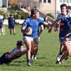 Southland Boys' centre Caleb Harvey carries the ball forward during an inter-school First XV game...