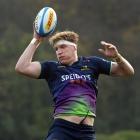 Highlanders lock Fabian Holland leaps high during a lineout drill at Logan Park earlier this week...