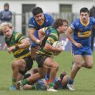 Green Island halfback James Arscott attempts to clear the ruck during a Dunedin division 1 game...
