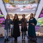 Delighted with the giant lanterns at the Meridian Mall are (from left) Meridian marketing manager...