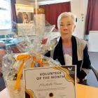 Michelle Pearse receives the volunteer of the month award, which acknowledges her efforts...