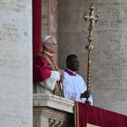 Newly elected Pope Leo XIV arrives on the main central loggia balcony of St Peter’s Basilica for...