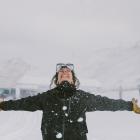 Coronet Peak staffer Ashlea Fahmy celebrates the start of winter at the skifield. PHOTO: NZSKI

