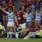 Argentina's Santiago Cordero celebrates scoring a try against the Lions. Photo: Reuters

