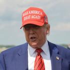 US President Donald Trump talks to reporters upon his arrival at Morristown Municipal Airport in...