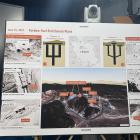 A poster of Iran's Fordow Fuel Enrichment Plant is displayed during a press briefing with US...