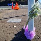 Tributes have been laid at the scene where Jayde Gilbert was hit and killed in Hamilton. Photo:...