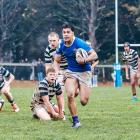 Southland Boys’ winger Zeke Siola charges to one of his three tries during the interschool...