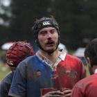 Mud-splattered Maniototo lock Ryan Becker prepares for a lineout during the game against...