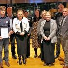 The Clutha Community Hub Charitable Trust and Committee are presented the Supreme Award at the...