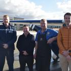 Posing in front of the aircraft used in the ‘‘Take a kid flying day’’ are (from left) Constable...