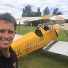2017 Warbirds scholarship programme recipient Adam Butcher in front of the 1940 built de...