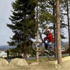 6-year-old Beau Rushbrook practises his jumps on the new dirt jump line at the Cromwell Bike Park...