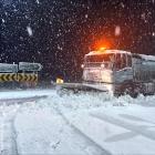 Central Otago District Council crews work to clear roads at Kyeburn affected by heavy snow in the...
