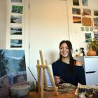University of Otago student Emma Milburn is painting 100 paintings of places in Dunedin. Photo:...