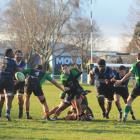 Eastern Northern Barbarians James Holland passes the ball to Taylor Peterson in a game against...
