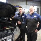 David Stevenson Auto apprentice Caiden Reid (left) practises using the workshop’s new Autel...