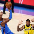 Oklahoma City Thunder guard Shai Gilgeous-Alexander shoots a pull-up jump shot as Indiana Pacers...