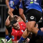 Will Jordan of the Crusaders scores a try during the semifinal match against the Blues. PHOTO:...