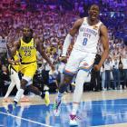 Oklahoma City Thunder's Jalen Williams celebrates a slam dunk as Indiana Pacers guard Aaron...