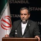 Iranian Foreign Minister Abbas Araghchi delivers a speech during a press conference as he attends...