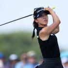 Lydia Ko of New Zealand hits a tee shot on the sixth hole during the first round of the PGA...