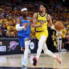 Indiana Pacers guard Tyrese Haliburton drives against Oklahoma City Thunder guard Shai Gilgeous...