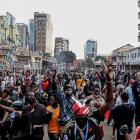Demonstrators carrying placards with names of the fallen Gen Z heroes walk down town Nairobi...