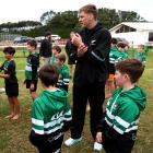 Fabian Holland runs a skills session with youngsters at the Coastal Rugby Club, in Taranaki,...