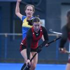 Momona’s Louisa Kotkamp controls the ball ahead of Taieri defender Erin Doleman at the McMillan...