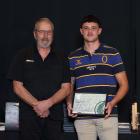 Callum Maze, of Roxburgh Logging (right), with John Taal from the Milton Stihl Shop, receives the...