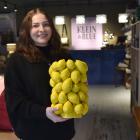 Klein &amp; Blue manager Jemma Powell shows off a lemon-shaped porcelain vase at the Moray Pl...