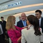 Prime Minister Christopher Luxon (centre) and Tourism Minister Louise Upston (to his left) at...