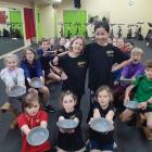 Rehearsing for their roles as Oliver are (standing, left) Corrin Richardson and Quinn Conlan...