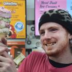 Rob Roy Dairy server Jamie Muir holds a double-serve ice cream cone. PHOTO: PETER MCINTOSH