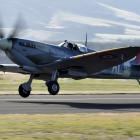 A vintage Spitfire takes off for a practice flight during Warbirds over Wanaka last year. PHOTO:...