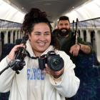 Lindsay Sinien, 36 (left), and Jurij Boccioli, 35, both of France, board the Stargazer train to...