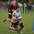 University second five Mac Harris dives over for a try against Zingari-Richmond during a Dunedin...
