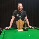 Simon Singleton with his recent South Island singles title-winning trophy. PHOTO: SUPPLIED