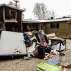 Flood damaged items piled up outside a property in the Motueka Valley. Photo: RNZ / Marika Khabazi
