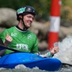 Nick Collier celebrates his win in the kayak cross at the junior canoe slalom world championships...