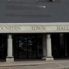 The Dunedin Town Hall brass sign, which has been covered up.