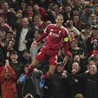 Liverpool captain Virgil van Dijk celebrates after scoring his side’s winning goal against...