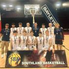 Māruawai College Senior A basketball team with teacher in charge Ryusei Wakushima (left) and...