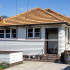 The fire broke out in the Holland St home on Monday afternoon. Photo: Geoff Sloan